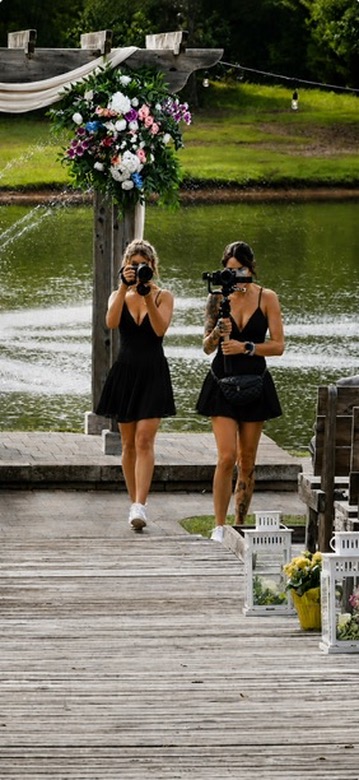 Shaylene and Scarlet photographing and filming a wedding together